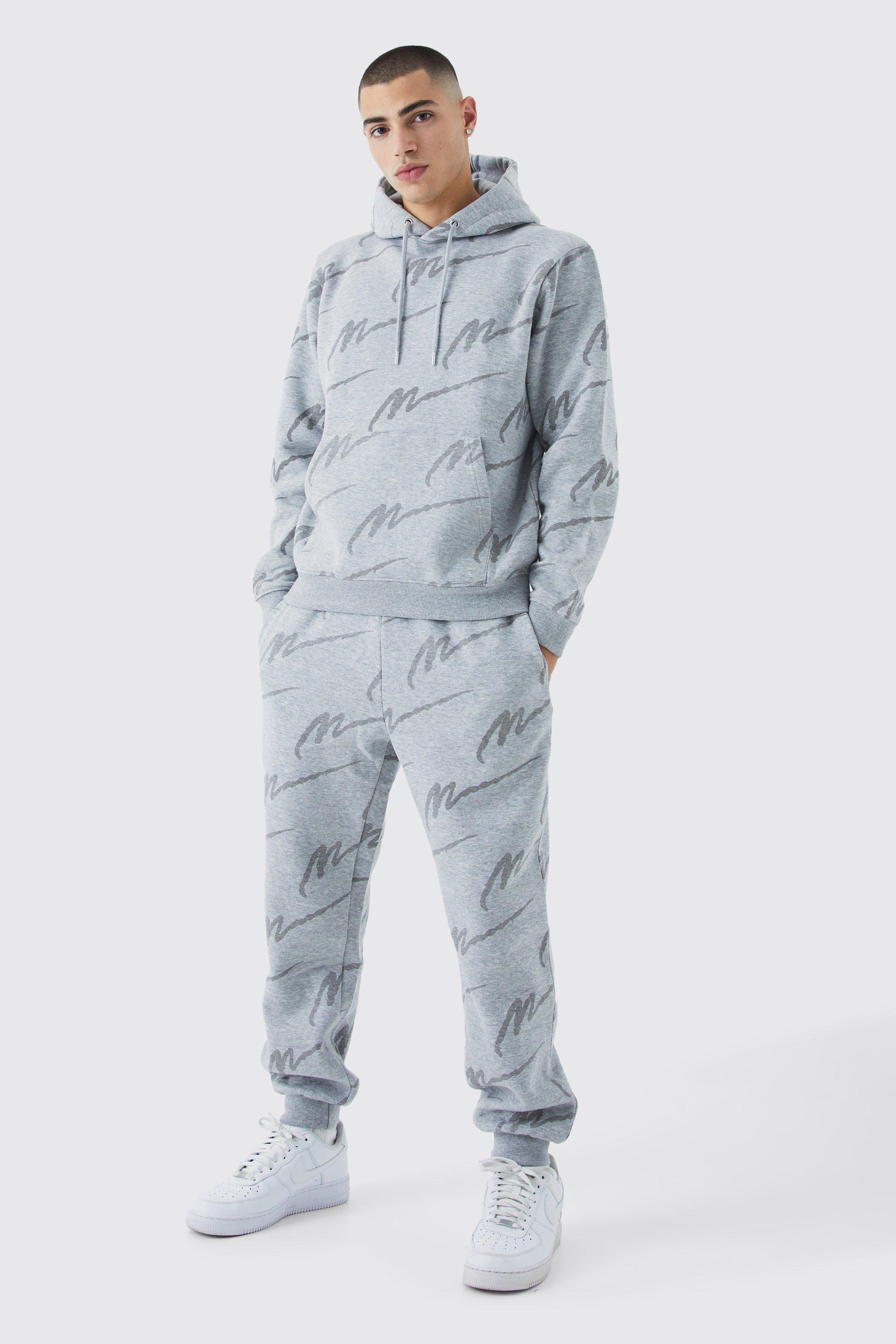 Boohooman all over store print tracksuit